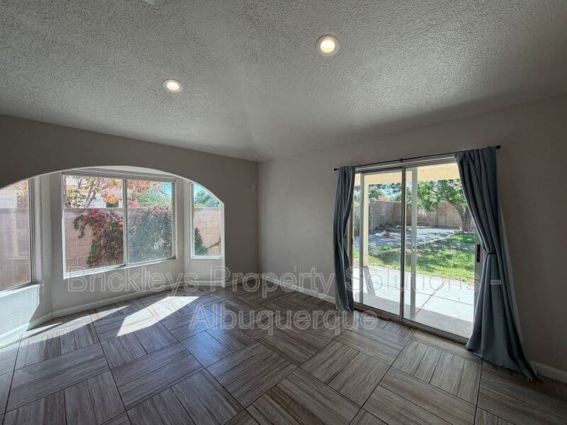 3-bedroom 2-bath home at 7024 Westford Pl NW for $2,200/mo managed by Brickleys Property Solutions Albuquerque — photo 9 of 33