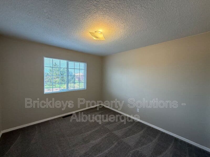 5-bedroom 4.5-bath home at 7008 Tree Line Ave NW for $2,500/mo managed by Brickleys Property Solutions Albuquerque — photo 20 of 43