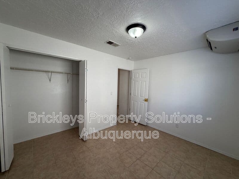 3-bedroom 2-bath home at 1405 Secret Valley Drive SW for $1,800/mo managed by Brickleys Property Solutions Albuquerque — photo 26 of 34