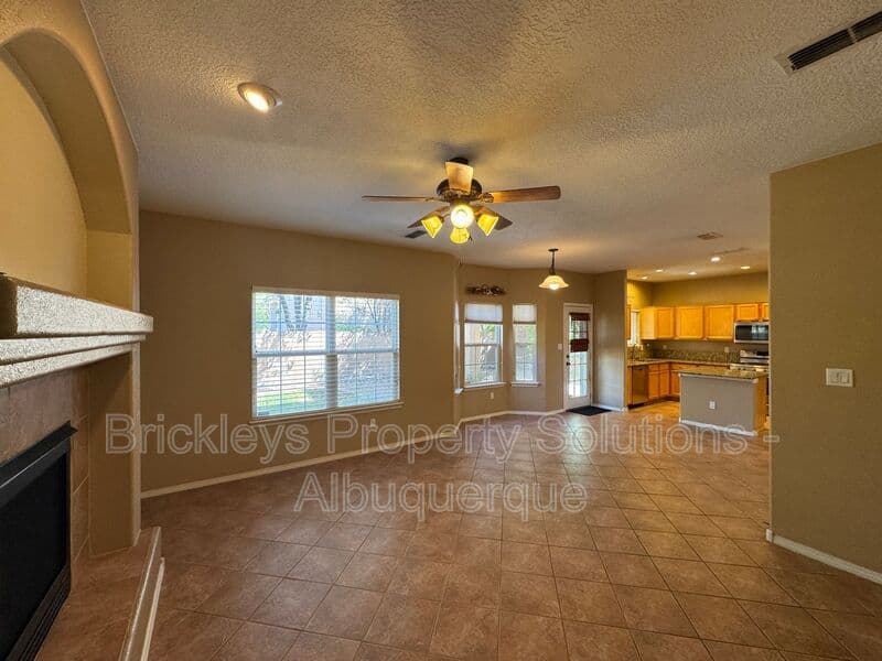 4-bedroom 3-bath home at 7131 Wild Olive Ave NE for $2,900/mo managed by Brickleys Property Solutions Albuquerque — photo 14 of 38