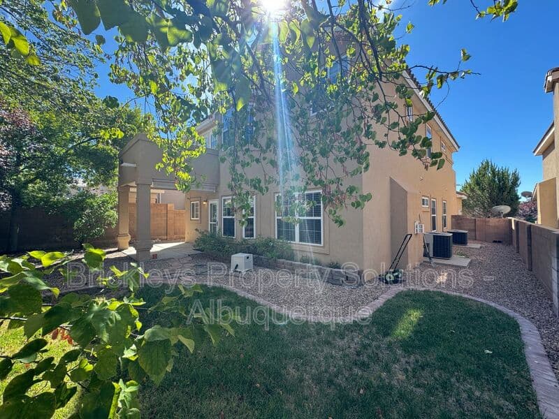 4-bedroom 3-bath home at 7131 Wild Olive Ave NE for $2,900/mo managed by Brickleys Property Solutions Albuquerque — photo 35 of 38