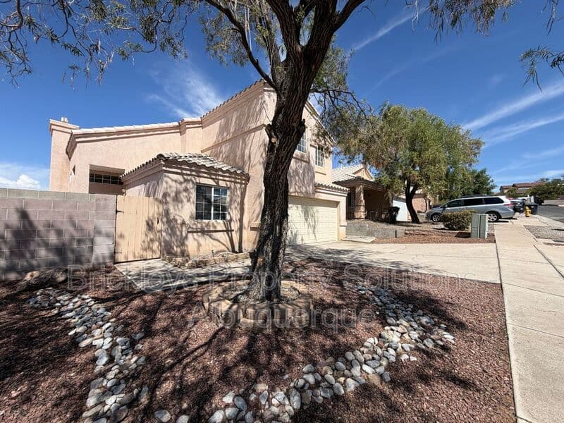 3-bedroom 2.5-bath home at 10527 Brookline Pl NW for $2,300/mo managed by Brickleys Property Solutions Albuquerque — photo 3 of 40