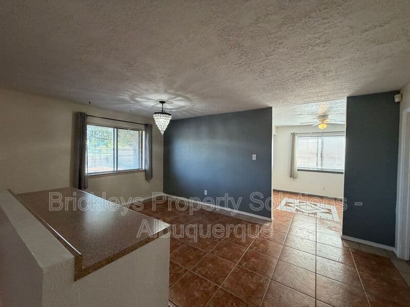 4-bedroom 2-bath home at 5812 Brahma Dr NW for $1,950/mo managed by Brickleys Property Solutions Albuquerque — photo 24 of 35