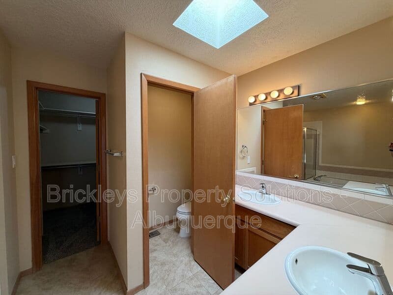3-bedroom 2-bath home at 12606 Colony Pl NE for $2,250/mo managed by Brickleys Property Solutions Albuquerque — photo 16 of 32