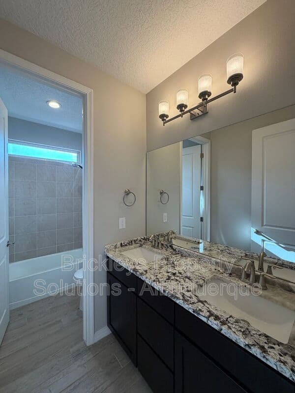 4-bedroom 2-bath home at 3969 Kodiak Rd NE for $2,700/mo managed by Brickleys Property Solutions Albuquerque — photo 8 of 40