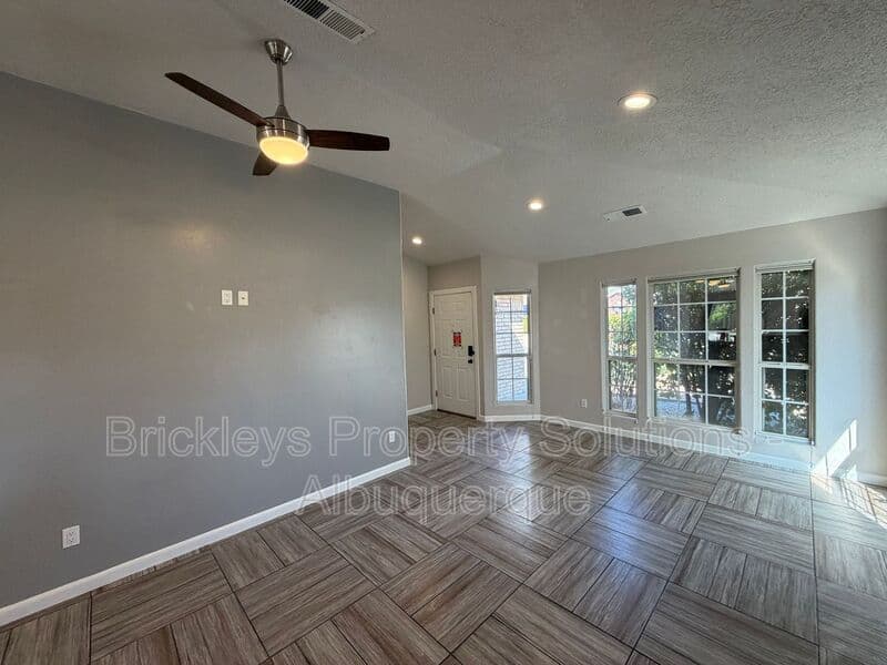 3-bedroom 2-bath home at 7024 Westford Pl NW for $2,200/mo managed by Brickleys Property Solutions Albuquerque — photo 6 of 33