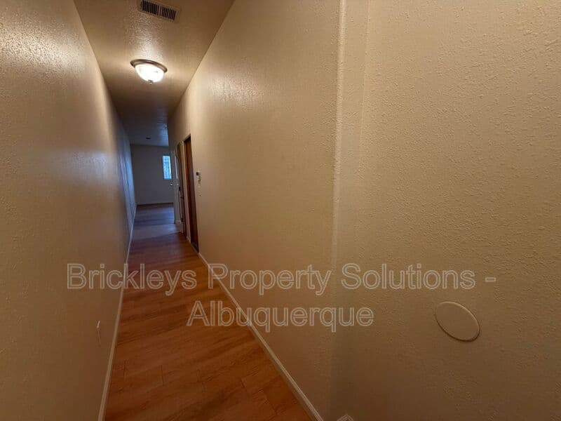 3-bedroom 2.5-bath home at 1612 3rd St SW for $1,900/mo managed by Brickleys Property Solutions Albuquerque — photo 3 of 39