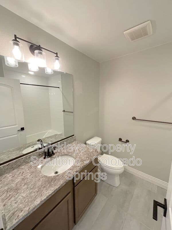 3-bedroom 2.5-bath home at 1721 Rose Quartz Hts for $2,300/mo managed by Brickleys Property Solutions Colorado Springs — photo 26 of 28