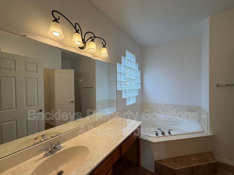 3-bedroom 2-bath home at 65 Willow Trace Court SE for $2,000/mo managed by Brickleys Property Solutions Albuquerque — photo 16 of 32