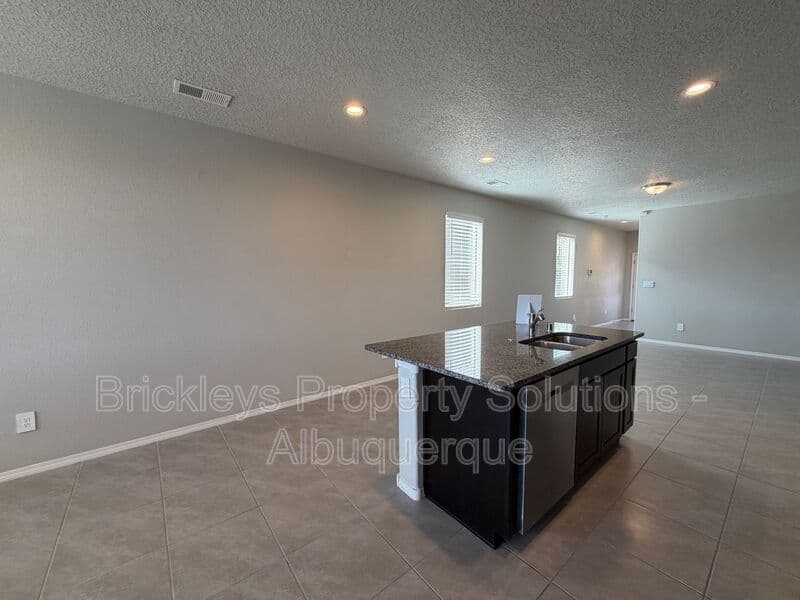 3-bedroom 2-bath home at 614 Turmalina Dr SE for $2,200/mo managed by Brickleys Property Solutions Albuquerque — photo 9 of 29