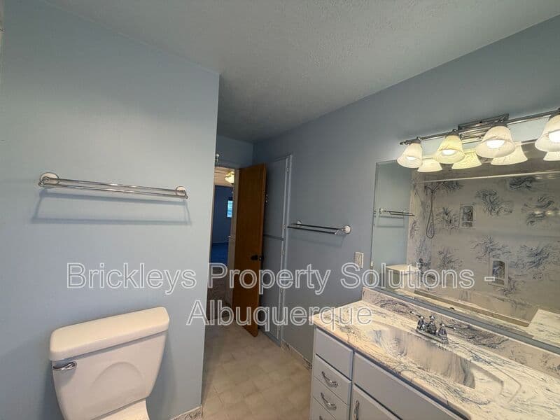 4-bedroom 3-bath home at 7121 Edwina Ave NE for $2,450/mo managed by Brickleys Property Solutions Albuquerque — photo 31 of 47
