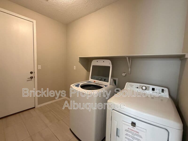 3-bedroom 2-bath home at 938 Lazuli Rd SE for $2,475/mo managed by Brickleys Property Solutions Albuquerque — photo 33 of 36