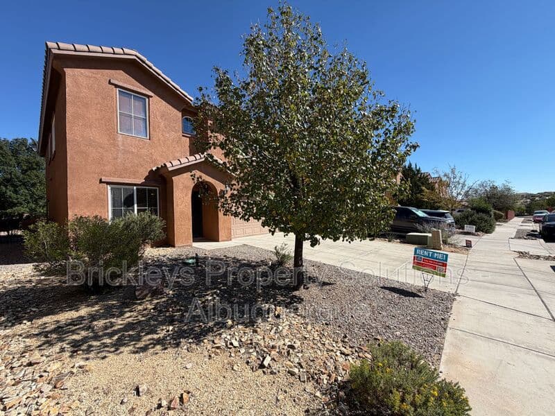 3-bedroom 2.5-bath home at 418 Paseo Roja Pl NE for $2,375/mo managed by Brickleys Property Solutions Albuquerque — photo 3 of 42