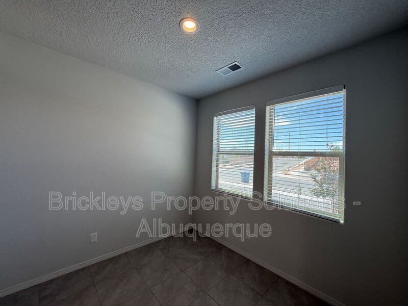 3-bedroom 2-bath home at 1504 Alto Colores for $2,100/mo managed by Brickleys Property Solutions Albuquerque — photo 5 of 30