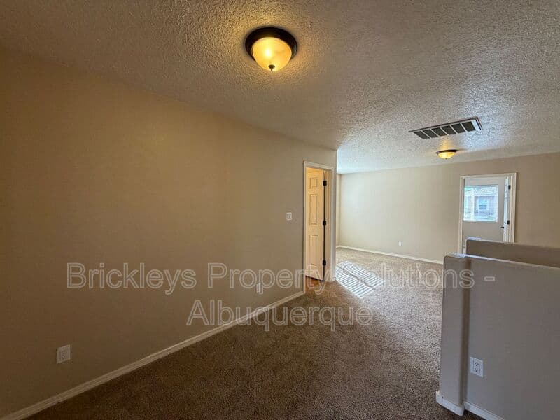 4-bedroom 3-bath home at 1904 Busher St. SE for $2,450/mo managed by Brickleys Property Solutions Albuquerque — photo 13 of 50