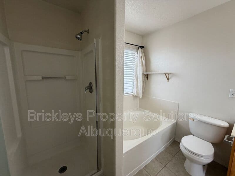 3-bedroom 3-bath home at 5004 Blue Stone Rd NW for $2,250/mo managed by Brickleys Property Solutions Albuquerque — photo 22 of 37