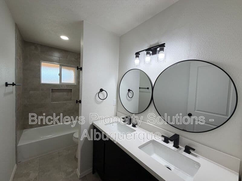 3-bedroom 2-bath home at 5608 Drake Ave NW for $2,100/mo managed by Brickleys Property Solutions Albuquerque — photo 7 of 32