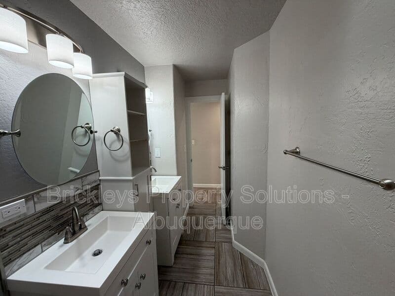 3-bedroom 2-bath home at 7024 Westford Pl NW for $2,200/mo managed by Brickleys Property Solutions Albuquerque — photo 13 of 33