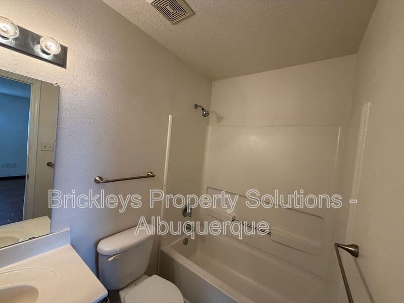 3-bedroom 3-bath home at 5004 Blue Stone Rd NW for $2,250/mo managed by Brickleys Property Solutions Albuquerque — photo 17 of 37