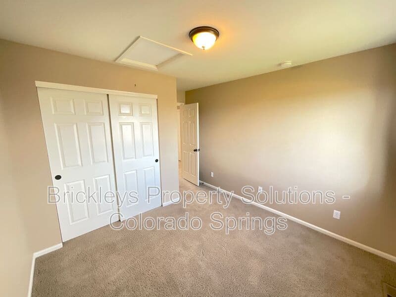 4-bedroom 2.5-bath home at 6652 Maple Stone Ln for $2,600/mo managed by Brickleys Property Solutions Colorado Springs — photo 37 of 43