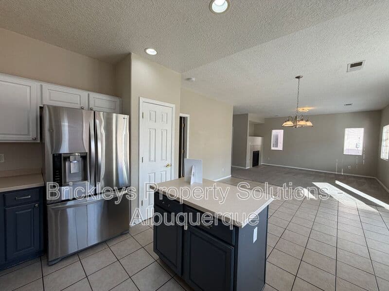 5-bedroom 4.5-bath home at 7008 Tree Line Ave NW for $2,500/mo managed by Brickleys Property Solutions Albuquerque — photo 34 of 43