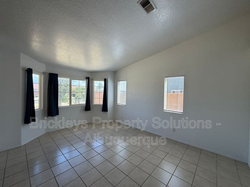 3-bedroom 2-bath home at 1405 Secret Valley Drive SW for $1,800/mo managed by Brickleys Property Solutions Albuquerque — photo 5 of 34
