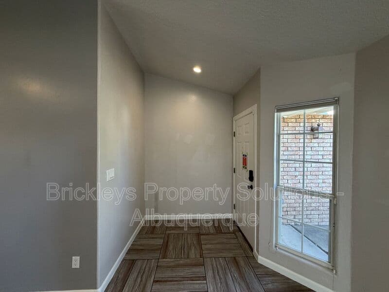 3-bedroom 2-bath home at 7024 Westford Pl NW for $2,200/mo managed by Brickleys Property Solutions Albuquerque — photo 4 of 33