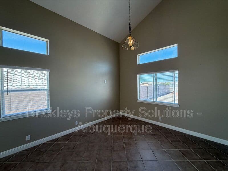 3-bedroom 2.5-bath home at 10527 Brookline Pl NW for $2,300/mo managed by Brickleys Property Solutions Albuquerque — photo 9 of 40