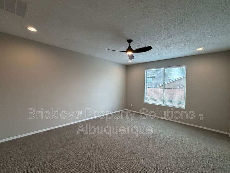 3-bedroom 2-bath home at 938 Lazuli Rd SE for $2,475/mo managed by Brickleys Property Solutions Albuquerque — photo 17 of 36