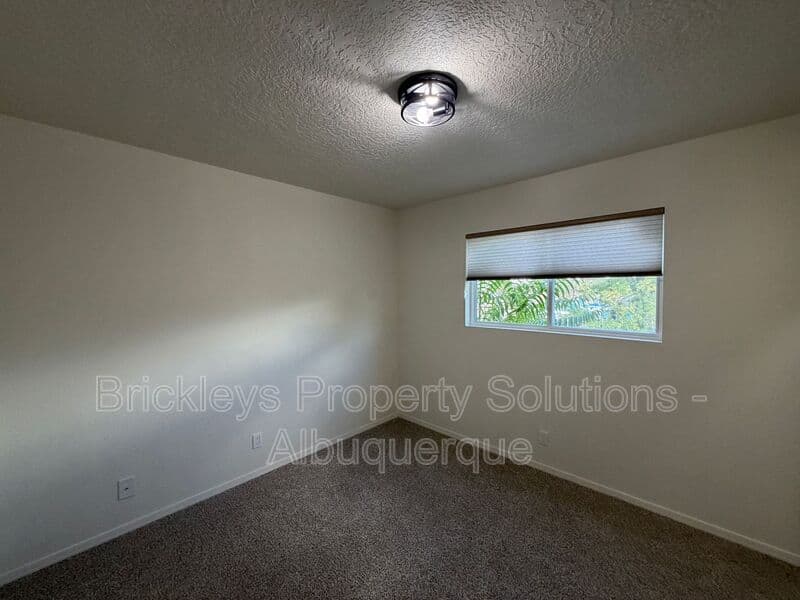3-bedroom 2-bath home at 5608 Drake Ave NW for $2,100/mo managed by Brickleys Property Solutions Albuquerque — photo 13 of 32