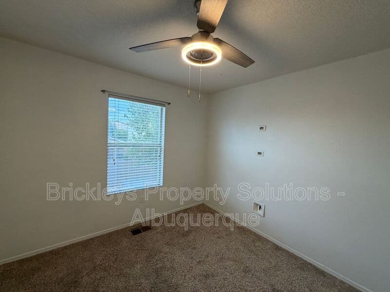 3-bedroom 3-bath home at 5004 Blue Stone Rd NW for $2,250/mo managed by Brickleys Property Solutions Albuquerque — photo 15 of 37
