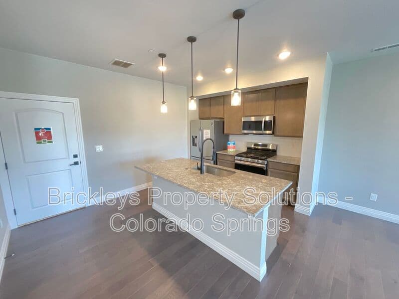 3-bedroom 2.5-bath home at 1721 Rose Quartz Hts for $2,300/mo managed by Brickleys Property Solutions Colorado Springs — photo 9 of 28