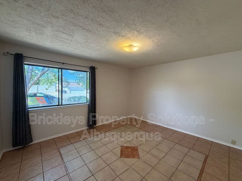 4-bedroom 2-bath home at 5812 Brahma Dr NW for $1,950/mo managed by Brickleys Property Solutions Albuquerque — photo 9 of 35