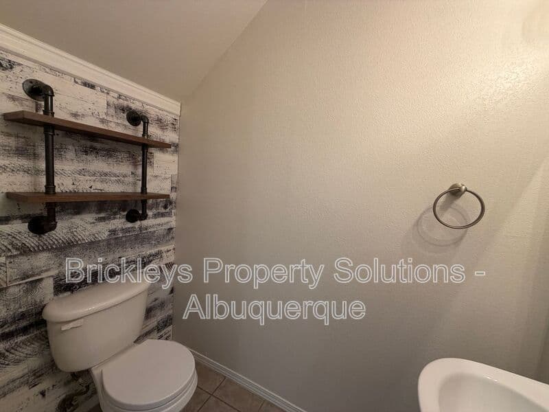 3-bedroom 3-bath home at 5004 Blue Stone Rd NW for $2,250/mo managed by Brickleys Property Solutions Albuquerque — photo 27 of 37