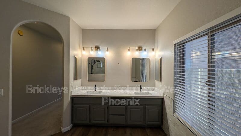 4-bedroom 3-bath home at 13354 W Palm Ln for $2,750/mo managed by Brickleys Property Solutions West Valley Phoenix — photo 10 of 31