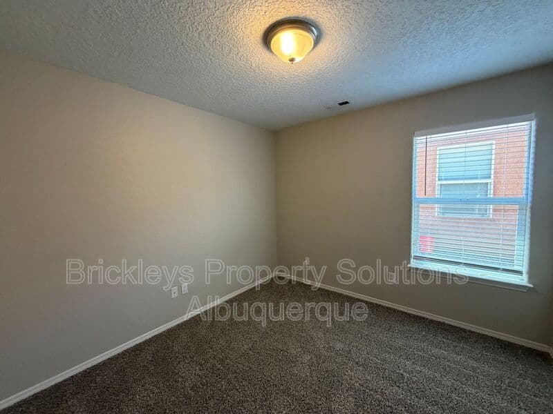 3-bedroom 2-bath home at 8035 Sierra Altos Pl. NW for $2,150/mo managed by Brickleys Property Solutions Albuquerque — photo 23 of 29