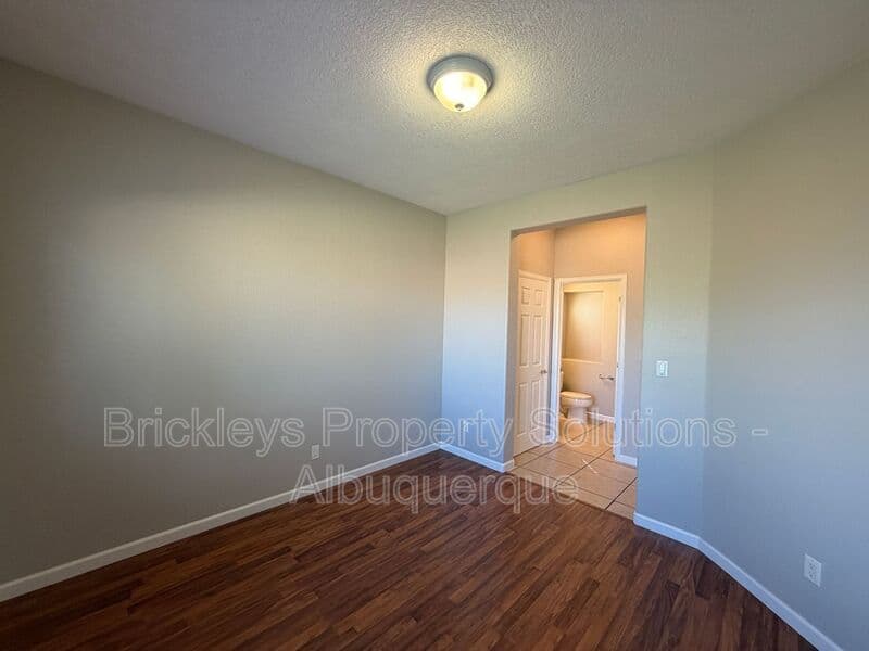 3-bedroom 2.5-bath home at 418 Paseo Roja Pl NE for $2,375/mo managed by Brickleys Property Solutions Albuquerque — photo 31 of 42