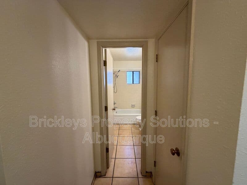 3-bedroom 2-bath home at 9937 Clearwater St. NW for $1,900/mo managed by Brickleys Property Solutions Albuquerque — photo 14 of 27