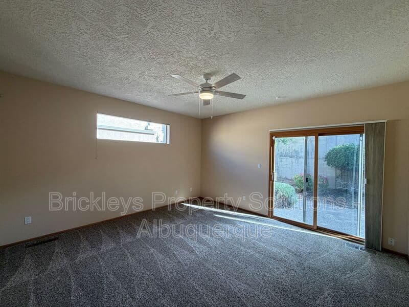 3-bedroom 2-bath home at 12606 Colony Pl NE for $2,250/mo managed by Brickleys Property Solutions Albuquerque — photo 13 of 32