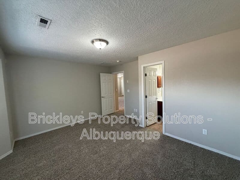 3-bedroom 2-bath home at 8035 Sierra Altos Pl. NW for $2,150/mo managed by Brickleys Property Solutions Albuquerque — photo 13 of 29