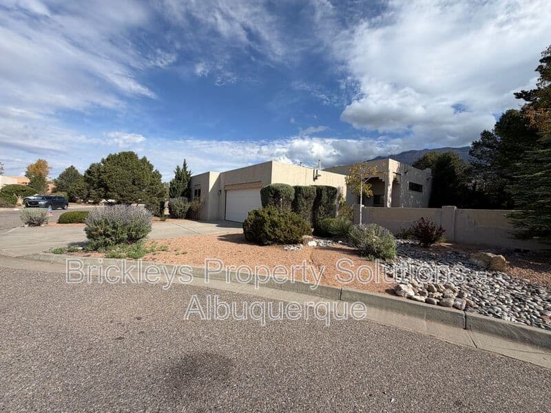 3-bedroom 2-bath home at 12606 Colony Pl NE for $2,250/mo managed by Brickleys Property Solutions Albuquerque — photo 3 of 32