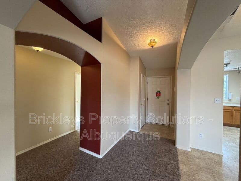 3-bedroom 2-bath home at 7704 Woodstar Ave NW for $1,825/mo managed by Brickleys Property Solutions Albuquerque — photo 11 of 28