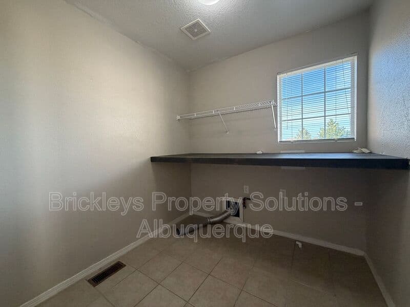 5-bedroom 4.5-bath home at 7008 Tree Line Ave NW for $2,500/mo managed by Brickleys Property Solutions Albuquerque — photo 24 of 43