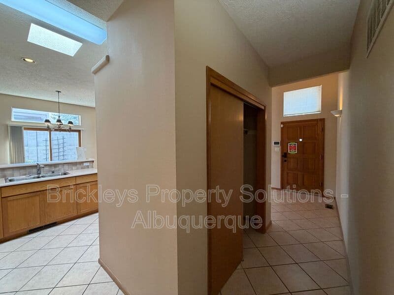 3-bedroom 2-bath home at 12606 Colony Pl NE for $2,250/mo managed by Brickleys Property Solutions Albuquerque — photo 11 of 32