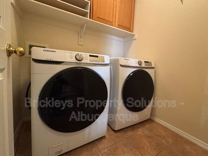 4-bedroom 3-bath home at 7131 Wild Olive Ave NE for $2,900/mo managed by Brickleys Property Solutions Albuquerque — photo 32 of 38
