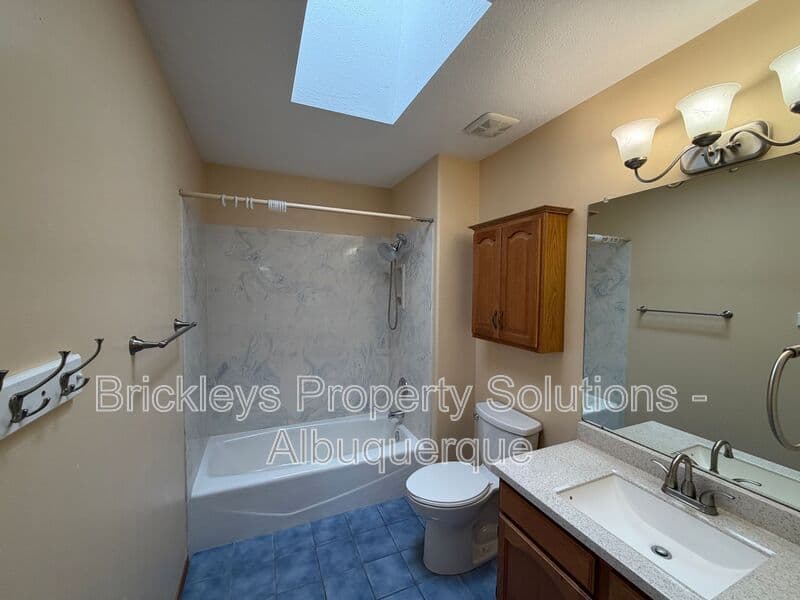 3-bedroom 2.5-bath home at 9600 Allande Rd NE for $3,200/mo managed by Brickleys Property Solutions Albuquerque — photo 12 of 40
