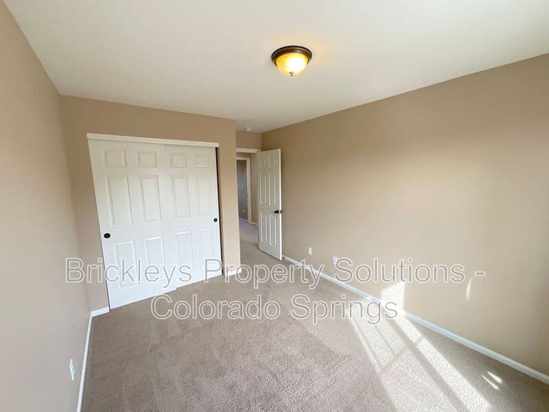 4-bedroom 2.5-bath home at 6652 Maple Stone Ln for $2,600/mo managed by Brickleys Property Solutions Colorado Springs — photo 33 of 43