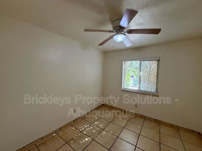 3-bedroom 2-bath home at 9937 Clearwater St. NW for $1,900/mo managed by Brickleys Property Solutions Albuquerque — photo 6 of 27