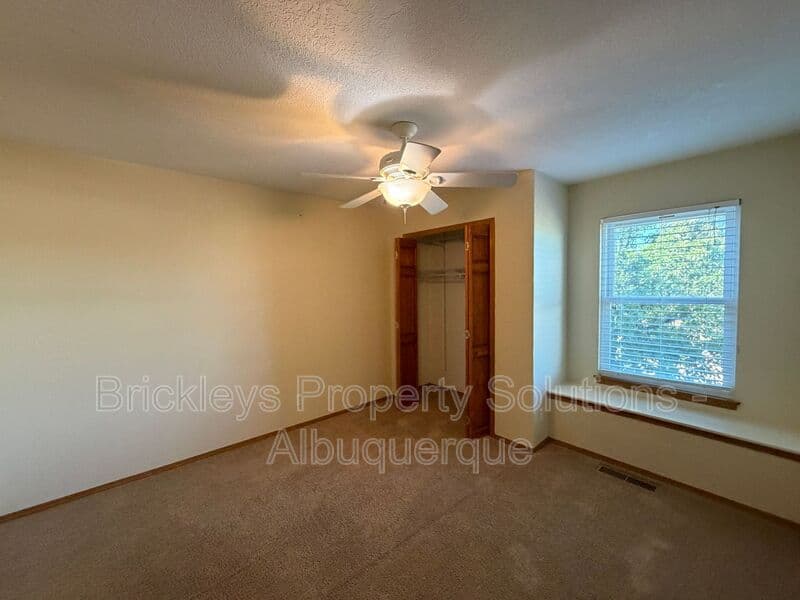 3-bedroom 2.5-bath home at 9600 Allande Rd NE for $3,200/mo managed by Brickleys Property Solutions Albuquerque — photo 8 of 40