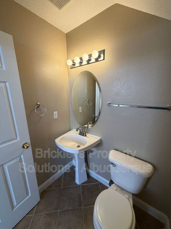 3-bedroom 2.5-bath home at 10527 Brookline Pl NW for $2,300/mo managed by Brickleys Property Solutions Albuquerque — photo 26 of 40